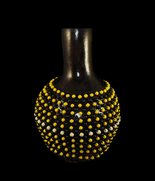 The Gold and Black Shekere